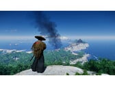 Пейзажный снимок из игры Ghost of Tsushima, на котором изображен Джин, стоящий на горе с видом на остров. (Источник изображения: Steam)